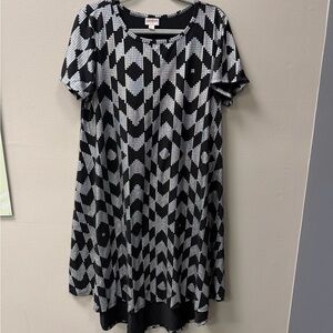 LuLaRoe Carly swing dress in a black and silver  geometric pattern.